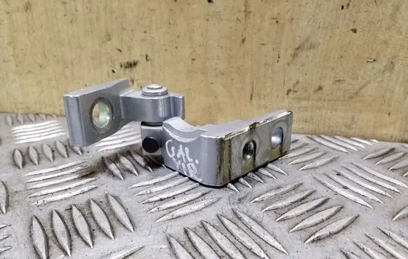 Rear door upper hinge
