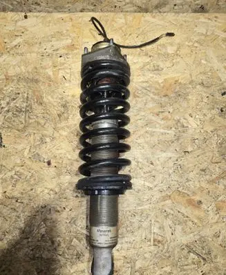 Front shock absorber with coil spring