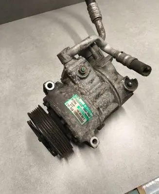 Volkswagen Golf SportWagen Air conditioning (A/C) compressor (pump) 1K0820803S 01732604663