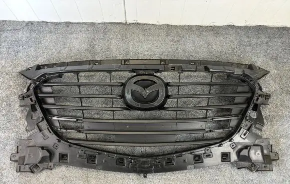 Mazda 3 II Front bumper upper radiator grill BANE50712 G080