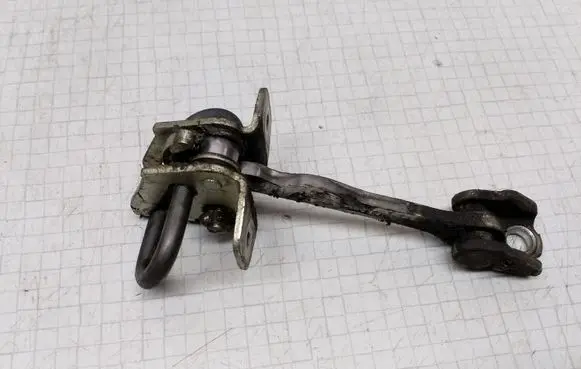 Opel Corsa C Rear door check strap stopper