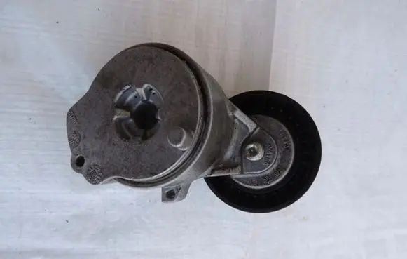 Opel Corsa F Timing belt tensioner 9841857180
