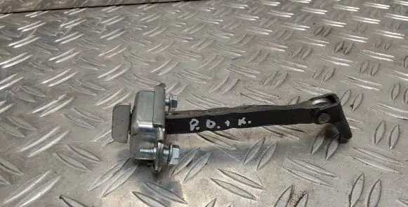 Front door check strap stopper