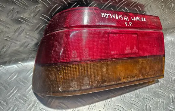 Mitsubishi Lancer Rear/tail lights 0438560L 0438560