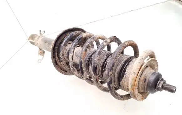 Volkswagen Golf IV Front shock absorber with coil spring