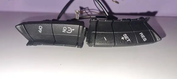 Steering wheel buttons/switches
