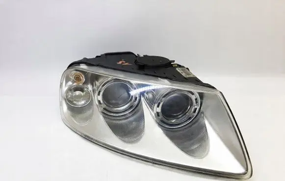 Volkswagen Touareg I Headlight/headlamp 7L6941016BQ