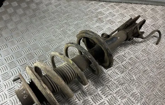 Hyundai Tucson JM Front shock absorber with coil spring