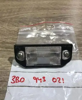 Volkswagen PASSAT B5 Number plate light 3b0943021