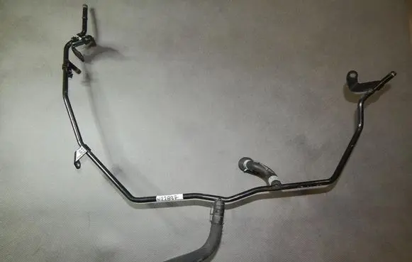 Volkswagen Golf VII Engine coolant pipe/hose 06K121075J