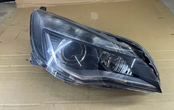 Opel Astra J Headlight/headlamp 13374518