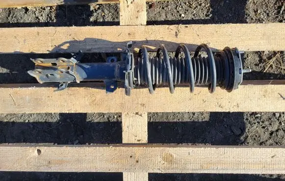 Ford Fiesta Front shock absorber with coil spring H1BC18045AC