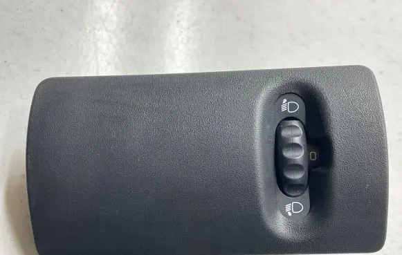 Headlight level height control switch