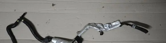 Volkswagen Golf VII Engine coolant pipe/hose 04L121070D