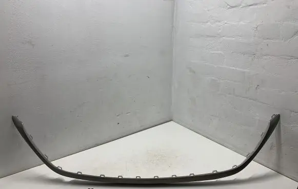 Rear bumper trim bar molding