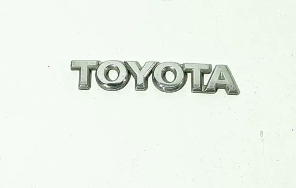 Toyota Corolla E120 E130 Manufacturers badge/model letters 