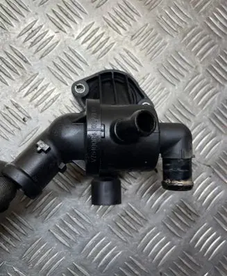 Thermostat/thermostat housing