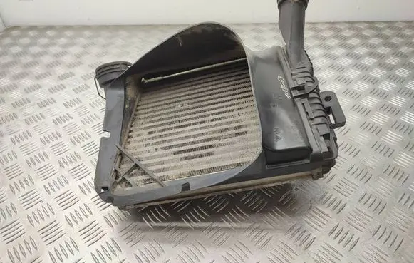 Volkswagen Touareg II Intercooler radiator 7P0145804A 7L0117340