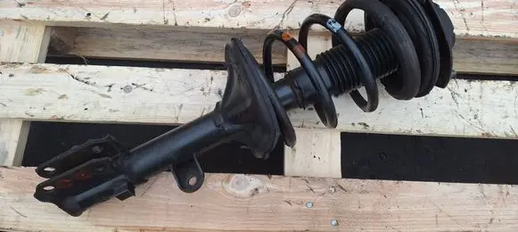 Hyundai Tucson JM Front shock absorber with coil spring