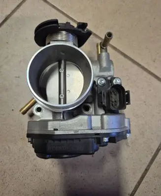 Volkswagen Golf IV Throttle valve 06a133064j 1115401000