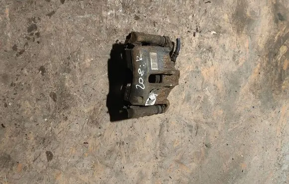 Peugeot 208 I Front brake caliper 