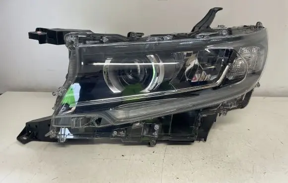 Toyota Land Cruiser (J150) Headlight/headlamp 8118560S00