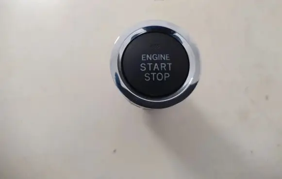 Engine start stop button switch