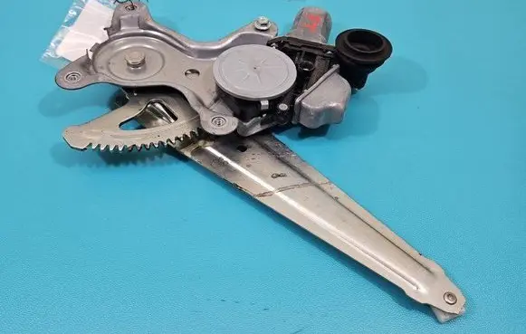 Rear door window regulator with motor