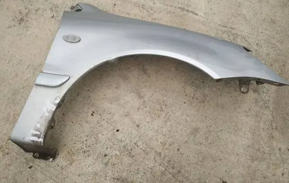 Mitsubishi Lancer Fender pilkas