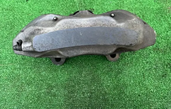 Volkswagen Touareg II Front brake caliper 209236067A