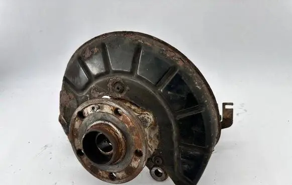 Volkswagen Touran I Front wheel hub spindle knuckle 1K0407255A