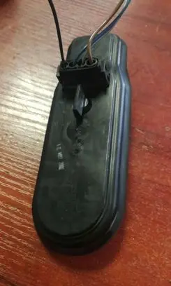 Tail light bulb cover holder