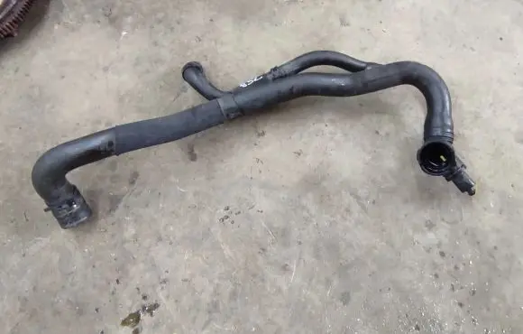 Volkswagen Jetta VI Engine coolant pipe/hose 1K0122051HT