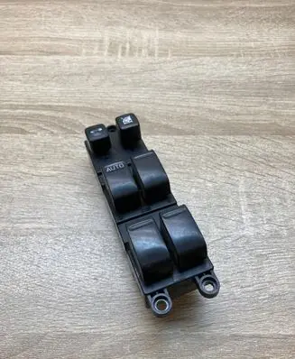 Nissan Primera Electric window control switch 25401AV640