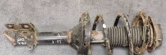 Subaru Outback Front shock absorber with coil spring