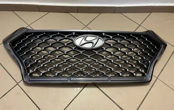 Hyundai Tucson TL Front bumper upper radiator grill 86351-D7700