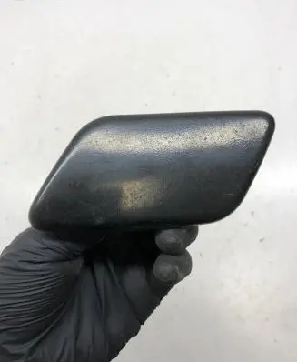 Headlight washer spray nozzle cap/cover