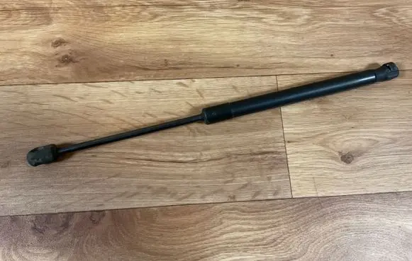 Volkswagen Caddy Front bonnet/hood damper/strut 1T0823359A