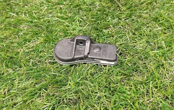 Opel Astra H Tire pressure sensor 52933B2100