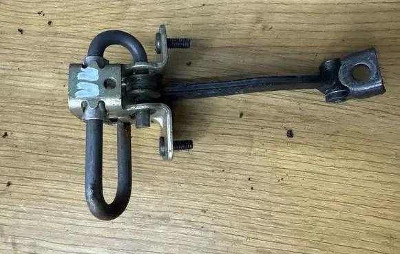 Volvo V70 Front door check strap stopper 