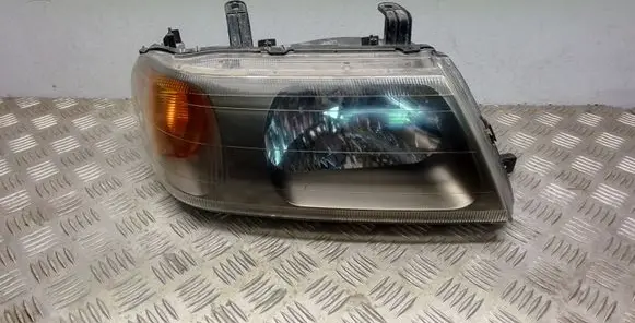 Mitsubishi Pajero Sport I Headlight/headlamp 10087418