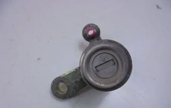Subaru Legacy Front door lock (next to the handle) 