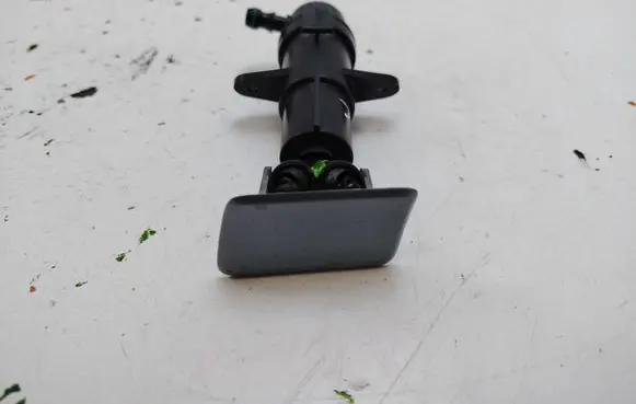 BMW X3 E83 Headlight washer spray nozzle 700194909