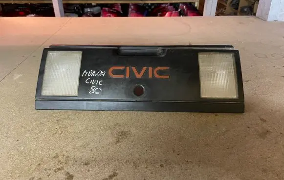 Honda Civic III Trunk door license plate light bar 0163652