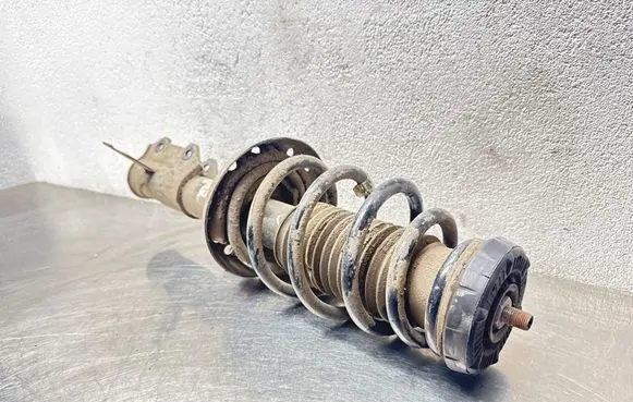 Opel Astra J Front shock absorber with coil spring 13354016 0701