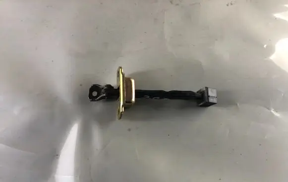 Rear door check strap stopper