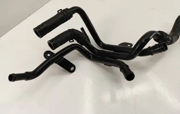 Volkswagen Golf VII Engine coolant pipe/hose 04L121064G