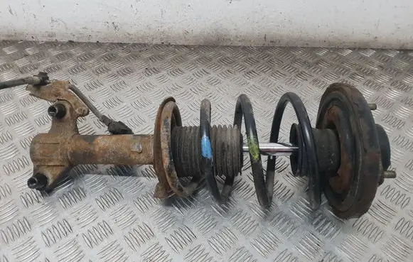 Nissan Primera Front shock absorber with coil spring
