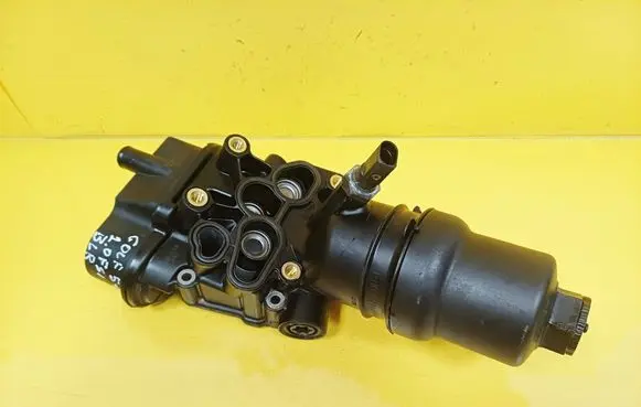 Volkswagen Golf Plus Oil filter mounting bracket 06D115397K