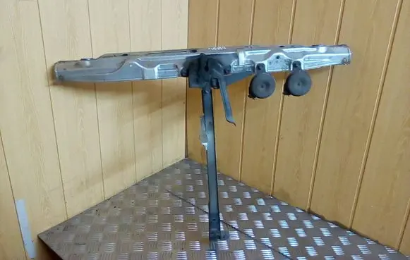 Radiator support slam panel